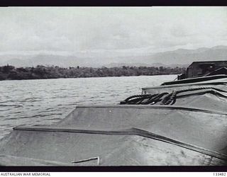 LAE, NEW GUINEA. 1943-09-30. THICK JUNGLE-FRINGED SHORE ALONG WHICH UNITS OF THE 9TH AUSTRALIAN DIVISION ADVANCED ON LAE