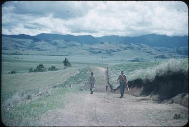 Aviamp area (now with small scattered population), image depicts Dr John McCaffrey on left, Dr Terry Spencer on right with bow : Waghi Valley, Papua New Guinea, 1954 / Terence and Margaret Spencer