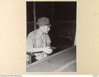 TOKO, BOUGAINVILLE. 1945-08-18. MAJOR OTSU, THE JAPANESE SURRENDER ENVOY AT HEADQUARTERS 3 DIVISION, DURING HIS INTERVIEW WITH BRIGADIER A.R. GARRETT, BGS, HEADQUARTERS 2 CORPS