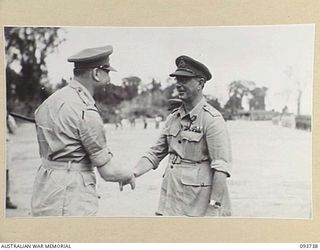 TOROKINA, BOUGAINVILLE, 1945-07-05. HIS ROYAL HIGHNESS, THE DUKE OF GLOUCESTER, GOVERNOR-GENERAL OF AUSTRALIA (1) SAYING GOODBYE TO LIEUTENANT-GENERAL OF S.G. SAVIGE, GENERAL OFFICER COMMANDING 2 ..