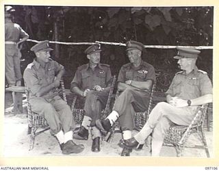 BOUGAINVILLE. 1945-09-26. MAJOR GENERAL W. BRIDGEFORD, GENERAL OFFICER COMMANDING 3 DIVISION, WITH HIS UNIT COMMANDERS