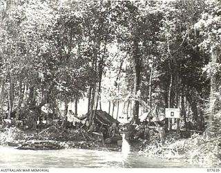 JACQUINOT BAY, NEW BRITAIN. 1944-12-18-20. A SECTION OF THE 5TH DIVISION RECEPTION CAMP BEACH-HEAD SITUATED BETWEEN THE MALMAL AND PALMALMAL PLANTATIONS