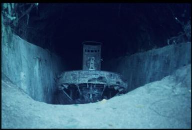 Japanese barge in concreted tunnel : Rabaul, New Britain, Papua New Guinea, 1971 / Terence and Margaret Spencer