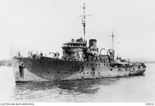 ORO BAY, NEW GUINEA. 1943-04-11. PORT BOW VIEW OF THE CORVETTE HMAS PIRIE (J189) SHOWING DAMAGE TO HER BRIDGE AND 12 POUNDER GUN, SUSTAINED WHEN SHE WAS HIT BY A BOMB IN A JAPANESE AIR RAID. THE ..