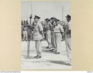 CAPE WOM, NEW GUINEA, 1945-09-13. MAJOR GENERAL H.C.H. ROBERTSON, GENERAL OFFICER COMMANDING 6 DIVISION, ADDRESSING TROOPS OF 6 DIVISION, DURING THE SURRENDER CEREMONY HELD AT CAPE WOM AIRSTRIP. ..