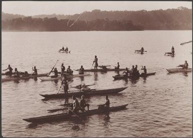 Solomon Islanders in canoes alongside the Southern Cross for trade at Santa Cruz, Santa Cruz Islands, 1906, 3 / J.W. Beattie
