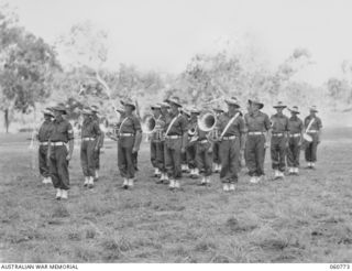 POM POM VALLEY, NEW GUINEA. 1943-11-27. CLOSE UP OF THE BAND OF THE 18TH AUSTRALIAN INFANTRY BRIGADE WHICH IS TO PLAY FOR THE CHAMPION GUARD TO THE SAME UNIT DURING THE TAKING OF A TRAINING FILM ..