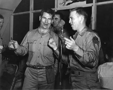 Two War Correspondents Provide Some Entertainment at Camp Dealey