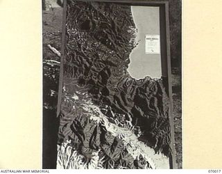 PORT MORESBY, NEW GUINEA. 1944-01-18. AN OPERATIONAL RELIEF MAP OF THE DUMPU - MADANG AREA CONSTRUCTED AT HEADQUARTERS, NEW GUINEA FORCE, BY NX101188 LIEUTENANT H.A. KILBY, G.S.I. (T). THIS CONTOUR ..