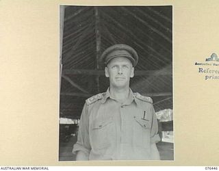 LAE, NEW GUINEA. 1944-10-02. VX101917 CAPTAIN R.A.I. FISHER, ASSISTANT CAMP COMMANDANT, HEADQUARTERS, NEW GUINEA FORCE