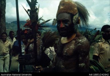 Male wearing head dress