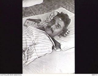 BORAM BEACH, NEW GUINEA, 1945-10-14. ELEVEN INDIAN SOLDIERS WERE LIBERATED FROM THE JAPANESE AT MARIENBERG IN THE SEPIK RIVER AREA, AND TAKEN TO 2/15TH FIELD AMBULANCE FOR MEDICAL TREATMENT. SHOWN, ..