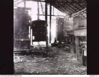 MILNE BAY, PAPUA, C.1942 -43. TWO FORD V8 GENERATORS IN THE POWERHOUSE AT NO. 37 RAAF RADAR STATION. (DONOR - T.G. JONES)