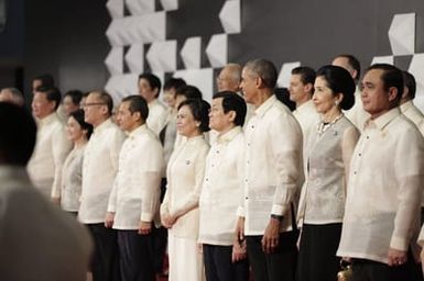 Barack Obama joins Asia Pacific Economic Cooperation Summit leaders and spouses for a group photo in Pasay, Metro Manila, Philippines, November 18, 2015