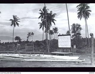 RABAUL, NEW BRITAIN, 1946-03-30. A TYPICAL UNIT OPEN AIR THEATRE IN THE AREA SERVICED BY MOBILE CINEMA HQ, AUSTRALIAN ARMY AMENITIES SERVICE. IT IS ONE OF TWELVE SPECIAL SITES AT WHICH DOUBLE ..