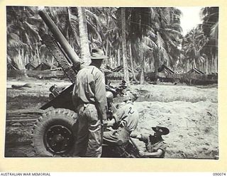 AITAPE, NEW GUINEA. 1945-03-10. ARTILLERY IN JUNGLE CONDITIONS. A NEW HIGH ANGLE 25-POUNDER POSITION INSTALLED IN THE 6 DIVISION AREA BY 2/3 FIELD REGIMENT, ROYAL AUSTRALIAN ARMY PERSONNEL. ..