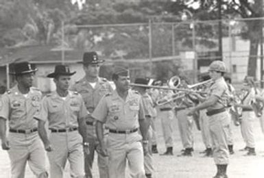 Soldiers Walking in Front of Band, 1975 August 8