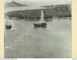 HANSA BAY, NEW GUINEA, 1943-08-28. FIRST OF A SERIES OF FIVE GRAPHIC PHOTOGRAPHS TAKEN FROM A RAAF PLANE DURING THE BOMBING OF JAPANESE SUPPLY CRAFT, ILLUSTRATING THE CONSEQUENCES OF FOLLOWING A ..