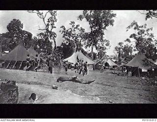 NEW GUINEA. 1943? JAPANESE PRISONERS OF WAR STAGGER INTO TENTS OF 2/9TH AUSTRALIAN GENERAL HOSPITAL (9AGH). NOTE THEIR EMACIATED CONDITION. (DONOR B. SHAW)