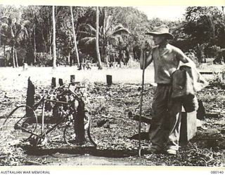 KOKODA, NEW GUINEA. 1942-12-22. THE REMAINS OF A PLANTER'S HOME DESTROYED IN A SCORCHED EARTH POLICY CARRIED OUT BY RETREATING JAPANESE FORCES NEAR KOKODA