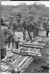 Closeup of men at a feast