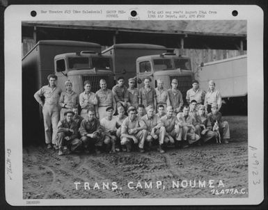 Personnel, Of The 13Th Air Depot Transient Camp Based On Noumea, New Caledonia, Pose In Front Of Trucks. (U.S. Air Force Number 71477AC)