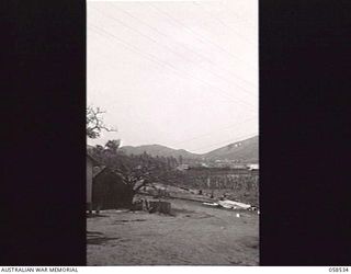 HANUABADA, NEW GUINEA. 1943-10-23. PORTION OF PORT MORESBY HARBOUR LOOKING ACROSS THE OLD VILLAGE. THIS VILLAGE IS USED BY THE AUSTRALIAN AND NEW GUINEA ADMINISTRATION UNIT TO HOUSE INDENTURED ..
