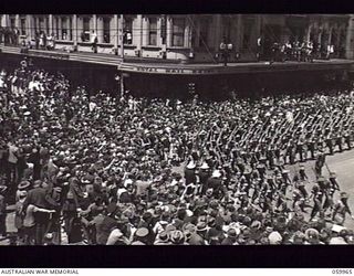 MELBOURNE, VIC. 1943-11-18. AFTER A LONG PERIOD OF FIGHTING IN NEW GUINEA, THE 17TH AUSTRALIAN INFANTRY BRIGADE WAS GIVEN LEAVE, AT THE CONCLUSION OF WHICH THE UNIT STAGED A MARCH THROUGH THE CITY. ..