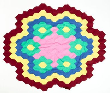 Pū tivaevae ta’ōrei (patch work quilt sample)
