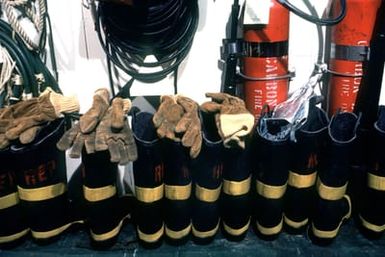 Firefighting gear stands ready for use aboard the amphibous assault ship USS GUAM (LPH 9)