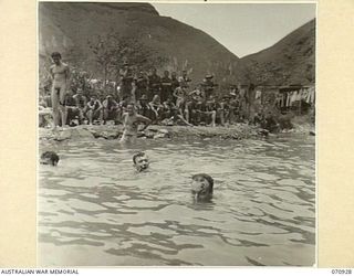 ZENAG, NEW GUINEA, 1944-02-27. THE FINISH OF A "SLOW MOTION" RACE AT A SPORTS CARNIVAL IN A CREEK DAMMED BY PERSONNEL OF THE 2/9TH FIELD COMPANY, ROYAL AUSTRALIAN ENGINEERS. THE CARNIVAL WAS ..