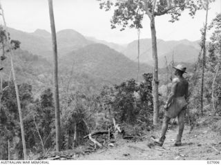 PAPUA, NEW GUINEA. 1942-09. VIEW ACROSS THE VALLEY FROM A HIGH RIDGE NEAR UBERI LOOKING TOWARDS IMITA RIDGE AND OIRABAIWA IN THE DISTANCE. THE JAPANESE ADVANCED TO THE LATTER RIDGE WHILE OUR ..