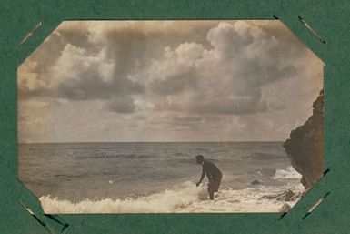 Man in the surf.  From the album: Banaba (Ocean Island)