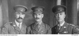 C. 1922. STUDIO PORTRAIT OF THE THREE COMMANDING OFFICERS OF 27TH BATTALION DURING WORLD WAR 1. LEFT TO RIGHT: LIEUTENANT COLONEL (LT COL) FREDERICK CHALMERS CMG DSO (COMMANDER 1917-12 TO 1919); LT ..