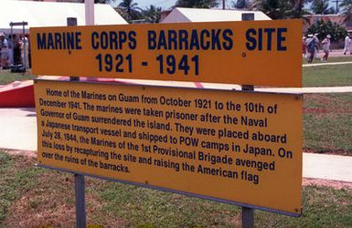 A historical marker on the U. S. Naval Base, Guam that identifies the significance of the Marine Barracks site. PHOTO was taken during the 50TH Anniversary Ceremony for the Liberation of Guam (WWII)