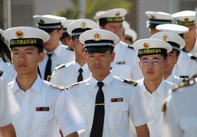 Chinese Peoples Liberation Army Navy Sailors from the Luhu (Type 052) Class Guided Missile Destroyer QINGDAO (DDG 113) and the Fuquing Class Replenishment Ship HONGZEHU (AOR 881) tour Pearl Harbor, Hawaii, during a Goodwill Visit on Sept. 7, 2006. The visit provides an excellent opportunity to enhance cooperation between the two navies and underscores the United States commitment to supporting ongoing cooperative efforts in the Pacific Region. (U.S. Navy photo by Mass Communication SPECIALIST 1ST Class James E. Foehl) (Released)