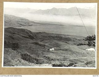 LAKES AREA, RAMU VALLEY, NEW GUINEA. 1944-01-01. VIEW FROM BERT'S POST LOOKING DOWN ON THE LAKES AREA. HEADQUARTERS 21ST INFANTRY BRIGADE CAN BE SEEN ON THE LEFT, WHILE BELOW AGAIN IS THE 2/14TH ..