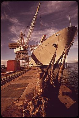 UNLOADING SUPPLIES FOR THE ISLANDS AT HONOLULU PIER