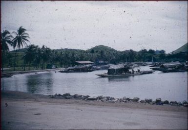 Canoes at Koki market : Port Moresby, Papua New Guinea, 1953 / Terence and Margaret Spencer