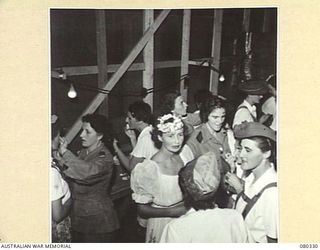 LAE, NEW GUINEA. 1944-08-01. THE LADIES' DRESSING ROOM DURING THE PRODUCTION OF "THE WHITE HORSE INN" BY THE STAFF OF THE 2/7TH GENERAL HOSPITAL, AUSTRALIAN ARMY MEDICAL CORPS FOR THE BENEFIT OF ..