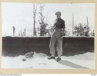 TOROKINA AREA, BOUGAINVILLE, 1945-08-06. THE THREE-FOOT SAND BANK WHICH AN M24 GENERAL CHAFFEE LIGHT TANK WILL ATTEMPT TO NEGOTIATE DURING TRIALS CONDUCTED FOR THE WAR OFFICE