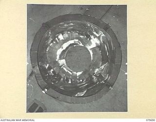 ORO BAY, NEW GUINEA. 1943-07. THE UNDERNEATH VIEW OF AN IMPROVISED SHADOWLESS LAMP USED IN THE OPERATING OF THE 10TH FIELD AMBULANCE, AUSTRALIAN ARMY MEDICAL CORPS