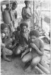 Playing 'aubinubin, or'aukwa'ikwa'i, panpipes