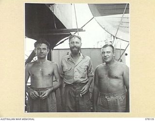 MIOS WUNDI, DUTCH NEW GUINEA. 1944-11-17. OFFICERS OF THE ROYAL AUSTRALIAN NAVY CORVETTE HMAS GLENELG. LEFT TO RIGHT: LIEUTENANT COMMANDER ROBSON, ROYAL AUSTRALIAN NAVY RESERVE (RANVR), CAPTAIN ..