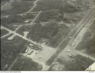 MILNE BAY, PAPUA. C. 1944-02. AERIAL VIEW OF GURNEY AIRFIELD, ONE OF THE BUSIEST AIRSTRIPS IN THE SOUTH-WEST PACIFIC AREA