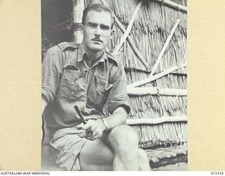 MENARI, NEW GUINEA. 1944-04-05. NGX135 WARRANT OFFICER II, J. BLANCO, MYOLA DISTRICT OFFICER, AUSTRALIAN NEW GUINEA ADMINISTRATIVE UNIT