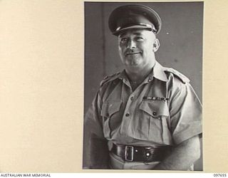 LAE, NEW GUINEA. 1945-10-04. LIEUTENANT COLONEL D.J. LAMB, CAMP COMMANDER, HEADQUARTERS FIRST ARMY