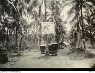 Dreger Harbour, New Guinea. 1944-01. The Strip Advanced Dressing Station operated by a detachment of the 10th Field Ambulance, Army Medical Corps. The sign, an adaptation from the Americans, shows ..