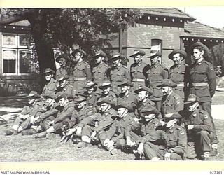 MELBOURNE, AUSTRALIA. 1942-10. GROUP OF PERSONNEL OF AUSTRALIAN ARMY CONCERT PARTY TAKEN ON THE EVE OF THEIR DEPARTURE FOR NEW GUINEA