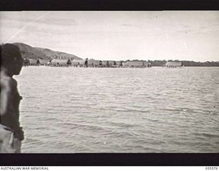 PORT MORESBY, NEW GUINEA. 1943-08-11. TUPUSELEI, A NATIVE VILLAGE IN THE PORT MORESBY AREA, SEEN FROM THE "MAINO", A SHIP OF THE 1ST AUSTRALIAN WATER TRANSPORT GROUP (SMALL CRAFT)